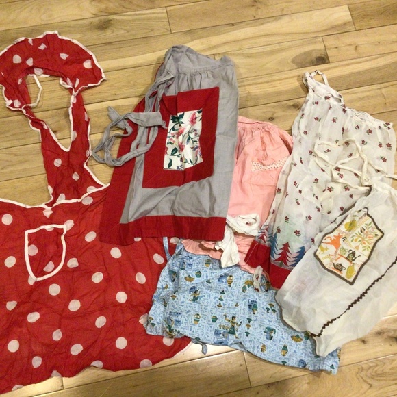 Six vintage aprons